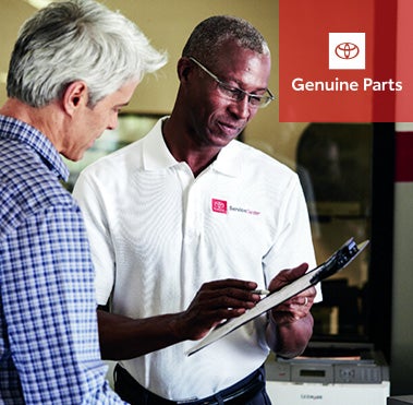 Toyota advisor helping customer | Falmouth Toyota in Bourne MA